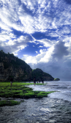 Matahari Terbenam di Pantai Ngrumput Gunung Kidul